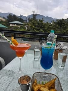 Open air rooftop terrace seating at Aristella restaurant