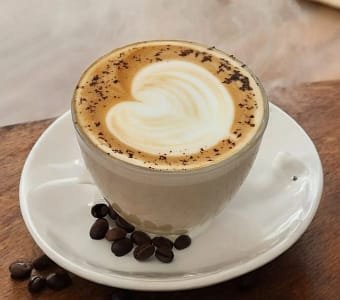 Artisanal beverages and gourmet plating at Aristella Cafe Dehradun