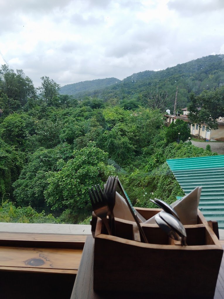 View of mountains from Aristella the best cafe in dehradun for family